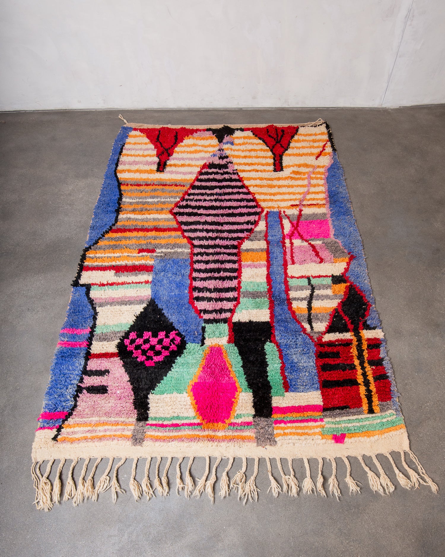 Modern, designer, handcrafted Berber rug from Morocco. Vintage carpet with beautiful colours and patterns and fluffy texture.